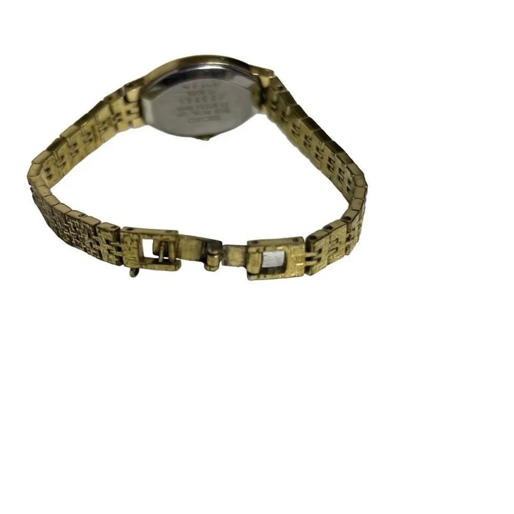 Seiko Women's Gold Tone Mechanical Movement Oval Champagne Stick Dial Wristwatch